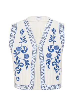 White vest with blue floral embroidery, v-neck design, and scalloped trim. Features vertical pleating and a tag labeled "Saint."
