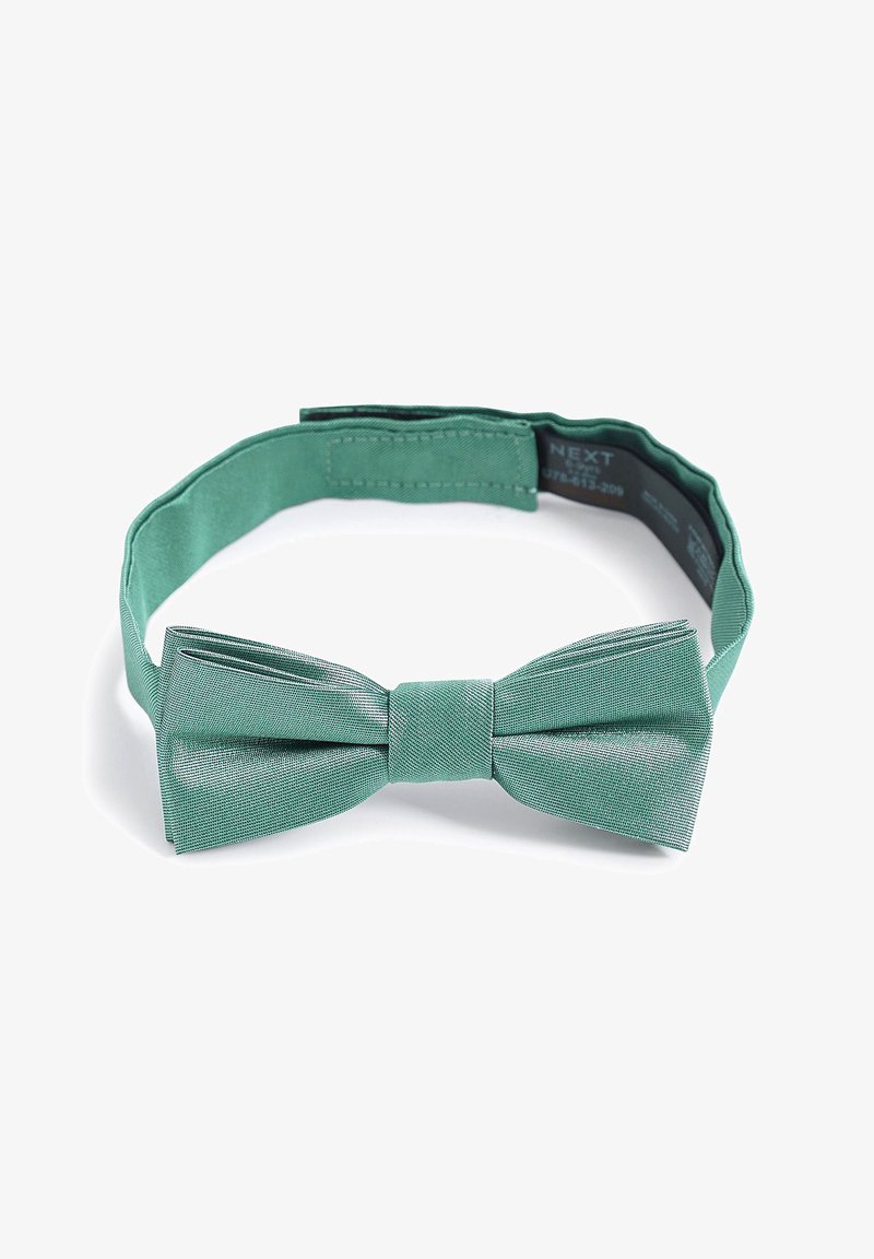 Zöldes-kék selyem csokornyakkendő texturált felülettel. Simaságot sugalló csomóval és állítható pánttal rendelkezik. Formális alkalmakra alkalmas.