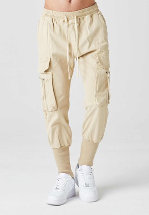 PREMIUM 2Y0111 SLIM FIT - Reisitaskuhousut - beige