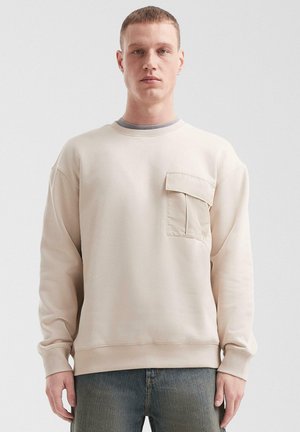 - Sweter