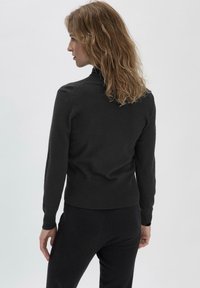 hessnatur WUNDERKIND - Strickpullover - schwarz