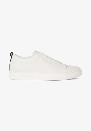 White leather sneaker with a rounded toe, flat rubber sole, and tonal stitching. Features lace-up front and a black heel pull tab.