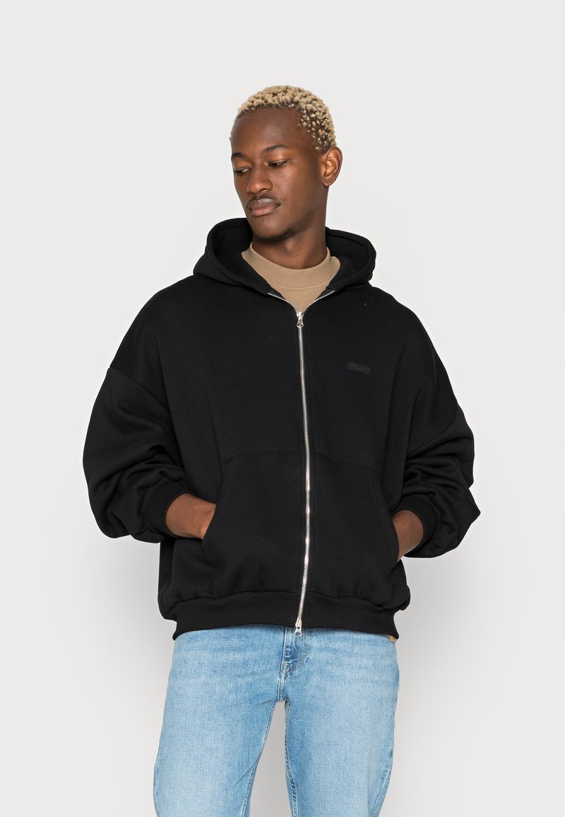 The Tracksuit Club HOODED UNISEX Zipup sweatshirt black Zalando.ie