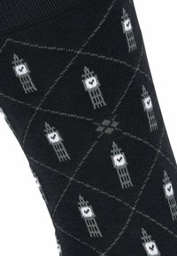 Czarne skarpetki w diamentowy wzór z szarym i białym przedstawieniem Big Bena. Wykonane z teksturowanej tkaniny z prążkowanym ściągaczem.