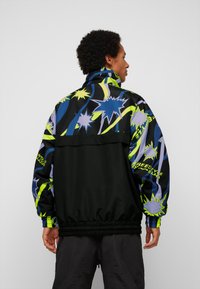 ELHO KANDAHA 89 UNISEX - Snowboardjacke - black anthra