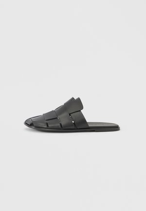 DIRA - Pantolette flach - black