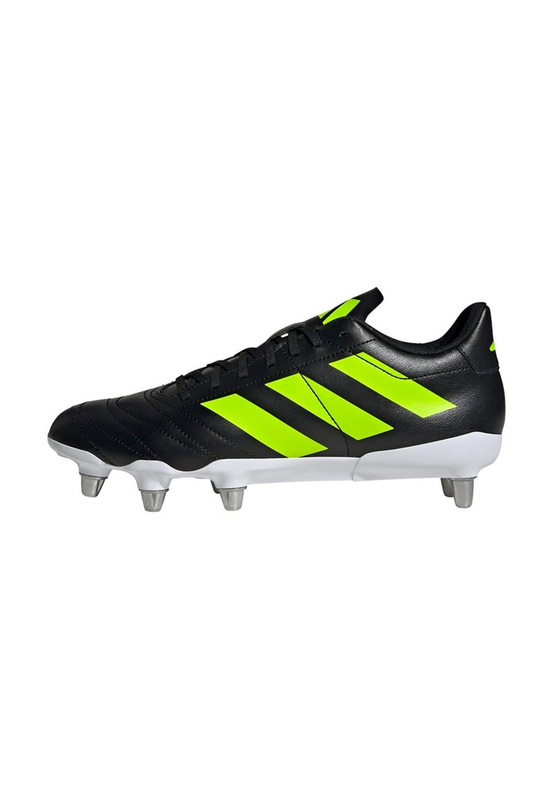 Zwarte voetbalschoenen met neon groene strepen, een gladde leren bovenkant, een witte buitenzool en zes metalen noppen voor grip.