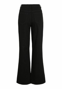 Crne široke traperice s visokim strukom, izrađene od trapera. Imaju dva stražnja džepa i vidljivo šivanje duž pojasnice i šavova.