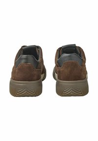 Brown suede sneakers with black leather accents, textured rubber soles, and a low-profile design featuring a curved back and pull tab.