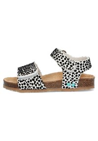 Zwart-wit gepunkte sandalen met kurken zool, verstelbare band en lichtblauwe accenten aan de zijkant. Vlak ontwerp, open teen stijl.