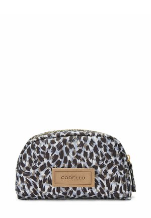 Kleine cosmetica-tas in een gestreept stof met zwarte en beige abstracte vlekken op een lichtblauwe achtergrond. Heeft een gouden rits en een leren label.