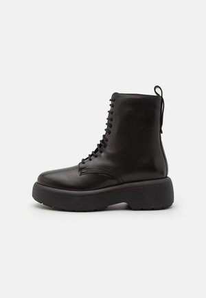 Bottines à plateau - black