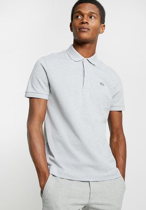 Gray polo shirt made of soft cotton, featuring a classic collar, short sleeves, and a subtle embroidered logo on the chest.