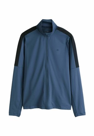 Blå zip-up-jacka med svarta axelpaneler; tillverkad av slät, lättviktig tyg; har hög krage och långa ärmar.