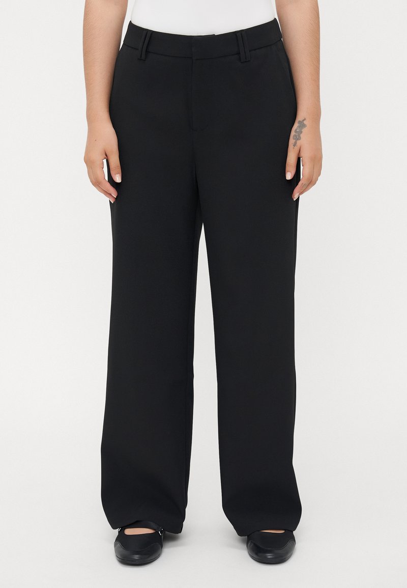 Black wide-leg trousers with a smooth texture, featuring a waistband with belt loops and slant pockets on each side.