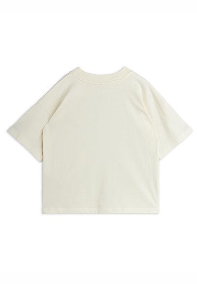 Κρέμα χρώματος, κοντομάνικο μπλουζάκι με στρογγυλή λαιμόκοψη, φτιαγμένο από μαλακό βαμβάκι. Διαθέτει χαλαρή, τετράγωνη γραμμή με απλή υφή και μινιμαλιστικό σχέδιο.