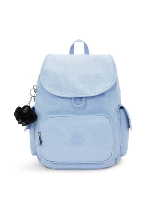 Light blue fabric backpack with a flap closure, front pocket, and a black plush gorilla keychain accessory attached. Smooth texture.