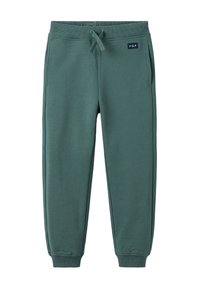 Groene sweatpants van zacht materiaal, met een elastische tailleband, trekkoord, zijzakken en geribde boorden bij de enkels.