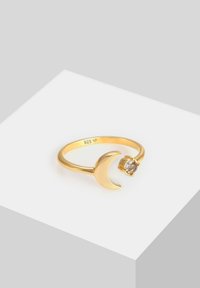 Goldring mit einer Halbmondform und einem klaren Edelstein. Aus 925er Silber gefertigt mit glänzendem Finish. Einfaches, elegantes Design.