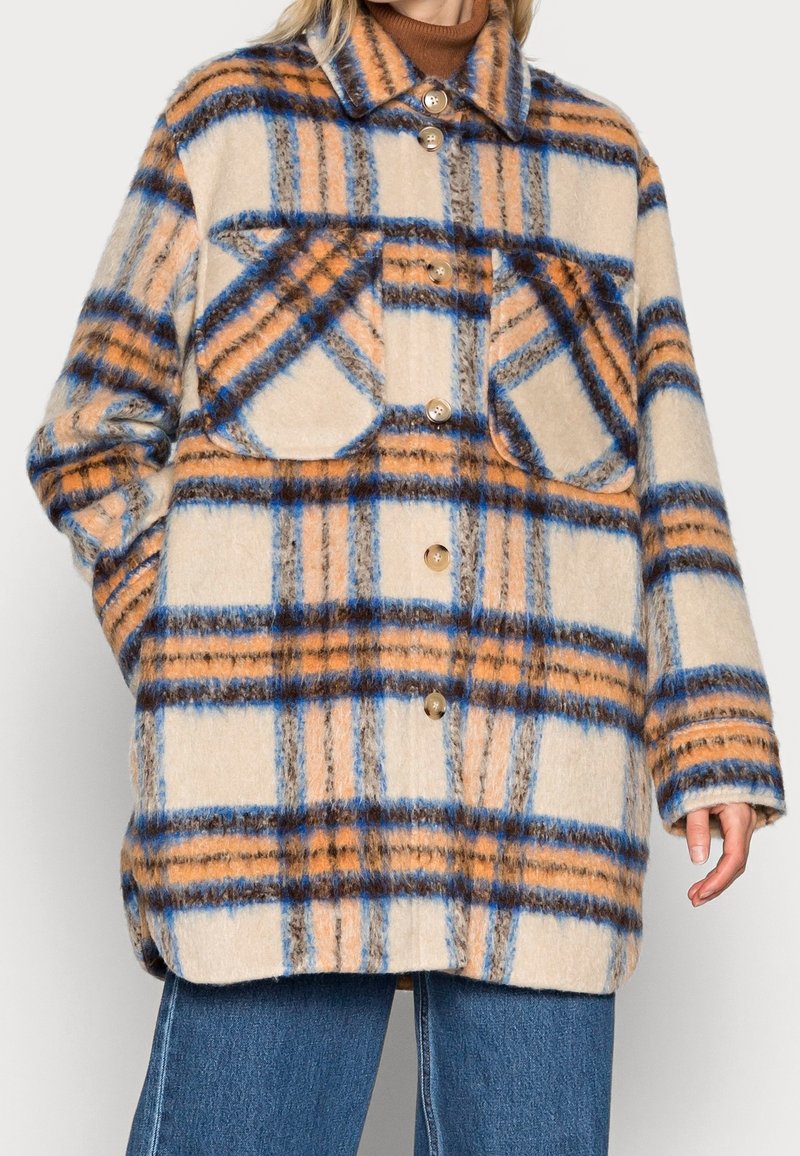 Rutig ullkappa i orange, blå och beige färger, med krage, knäppning och två bröstfickor.