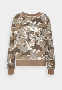 Kamouflage-sweatshirt i beige och brunt, med en stor silverfärgad grafisk logotyp i mitten. Mjuk tyg och ribbade ärmslut och fåll.
