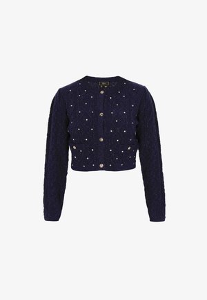 Cardigan court bleu marine avec un motif texturé, orné d'accents argentés et de cinq boutons ronds sur le devant.