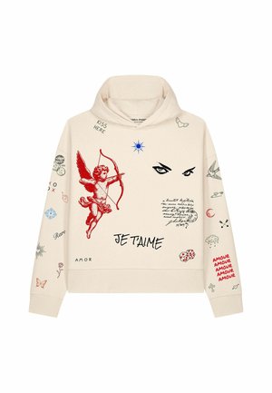 Beige hoodie with red cupid aiming a bow, black eyes, handwritten text "JE T'AIME," dice, and various small illustrations and words on sleeves.