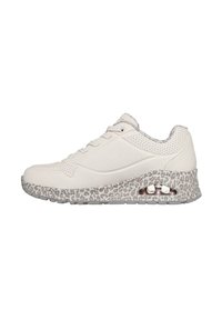 White sneaker with a textured beige leopard print midsole, lace-up front, and perforated detailing on the sides. Clear cushioning visible in heel.