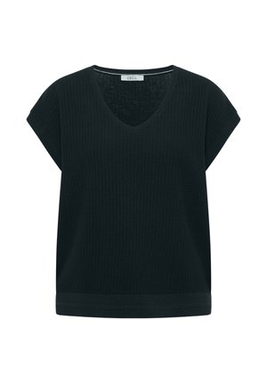 Femme aux cheveux bruns et raides portant un haut en maille texturée noire à manches courtes, vue de dos sur un fond uni.