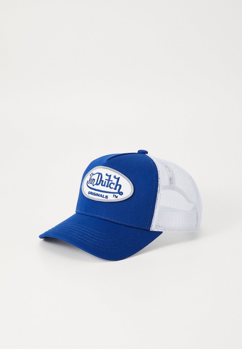 Blue trucker cap with a solid front panel and white mesh sides. Features an embroidered oval logo in blue and gray. Flat brim design.