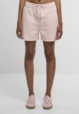 Rózsaszín, pamutkeverék rövidnadrág elasztikus derékrésszel és húzózsinórral. Sima textúrájú, elöl egy kis logóval díszített.