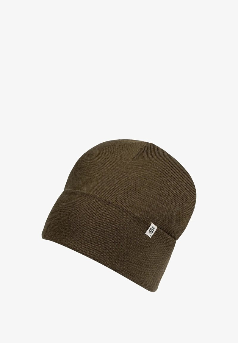 Dark olive green knitted beanie with a folded cuff and a small rectangular fabric tag on the cuff.