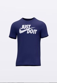 T-shirt bleu marine à manches courtes, arborant un grand logo blanc "JUST DO IT" et le swoosh Nike sur le devant, tissu lisse, coupe classique.