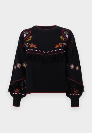 Pull noir avec une broderie colorée mettant en avant des motifs floraux et animaliers. Fini avec un détail en frange à la taille et des poignets à motifs.