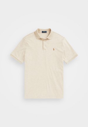 Polo beige in misto cotone, con patta a tre bottoni, colletto a coste, maniche corte e un piccolo logo sul lato sinistro del petto.