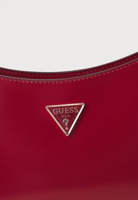 Guess ARNELA  - Kézitáska - red