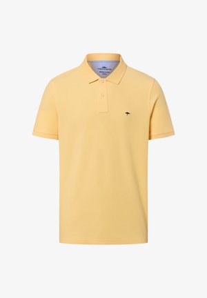 Żółta bawełniana koszulka polo z krótkim rękawem, z dwoma guzikami i małym haftowanym czarnym logo drzewa na lewej piersi.