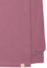 Top a maniche lunghe a coste in mauve, con una delicata texture e una piccola etichetta del brand in un colore a contrasto sull'orlo.