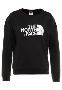 Sweatshirt preto feito de uma mistura de algodão, com decote redondo e mangas longas, apresentando um logótipo branco proeminente na frente.