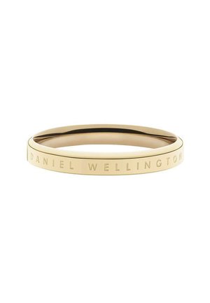 Gul rustfrit stålring med mat overflade og poleret inderside. Graveret med "DANIEL WELLINGTON" rundt om den ydre ring.