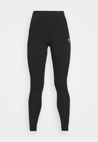 Černé sportovní legíny vyrobené z elastického materiálu. Vysoký pas s přiléhavým střihem a malým bílým logem na levém boku.