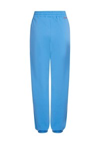 Svetlomodré nohavice vo voľnom strihu z mäkkého materiálu, s elastickým pásom a manžetami, s jednoduchým dizajnom.