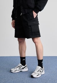 adidas Originals CARGO - Teplákové kalhoty - black