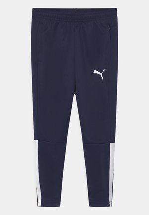 Navy Sportleggings aus leichtem Stoff, mit einem weißen Puma-Logo und Netzbesätzen an den unteren Seiten. Verfügt über Seitentaschen.