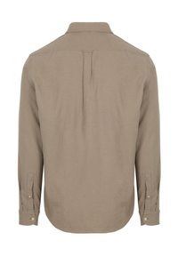 Khakikleurig shirt met lange mouwen, een omklapbare kraag met knopen, een plooi aan de achterkant, en mouwen met knopen. Glad materiaal en een afgeronde zoom.