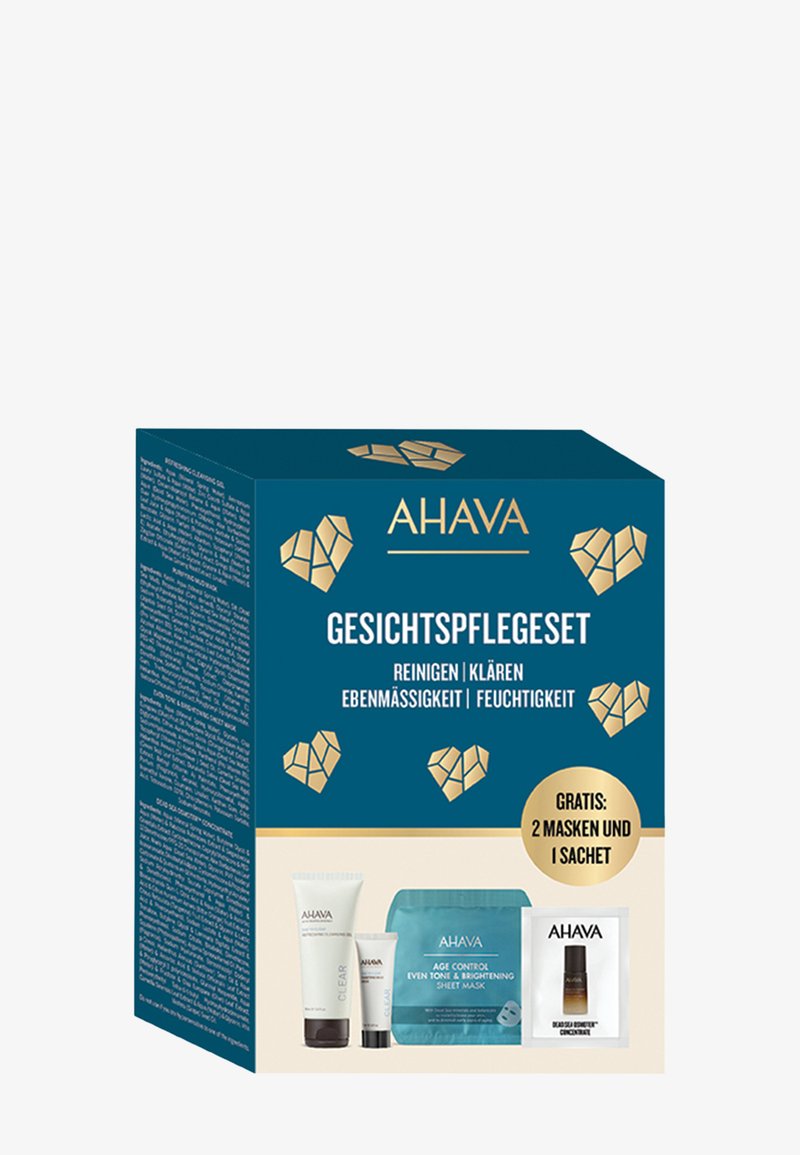 Coffret de soins du visage AHAVA en teal avec des accents dorés, comprenant des tubes et un masque, avec un texte en allemand détaillant les bienfaits et les offres promotionnelles.