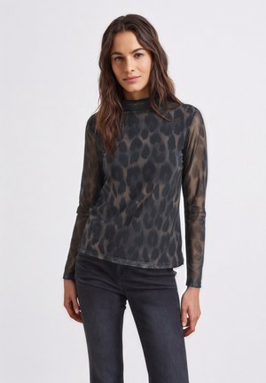 Lange mouwen, nauwsluitend bovenstuk gemaakt van doorschijnende, geprinte stof. Heeft een hoge hals en een zwart-grijs luipaardprintontwerp.