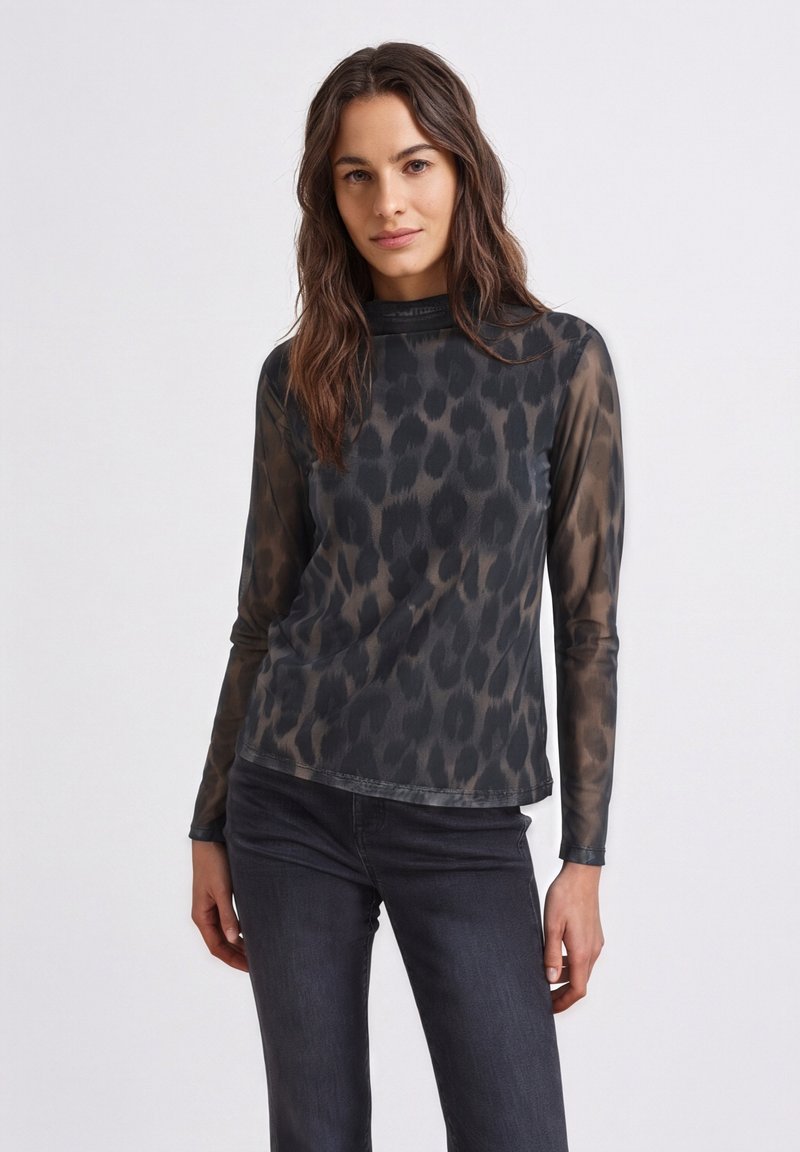 Lange mouwen, nauwsluitend bovenstuk gemaakt van doorschijnende, geprinte stof. Heeft een hoge hals en een zwart-grijs luipaardprintontwerp.