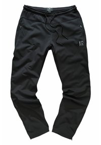 Pantaloni sportivi neri con una superficie liscia, vita elastica, cordino regolabile e tasche laterali con zip. Presentano un logo sulla parte anteriore.