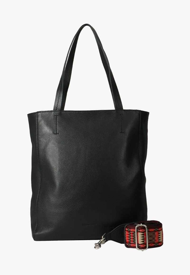 Sac cabas en cuir noir avec deux bretelles d'épaule et une sangle en tissu brodée détachable avec des motifs géométriques rouges, beiges et noirs.